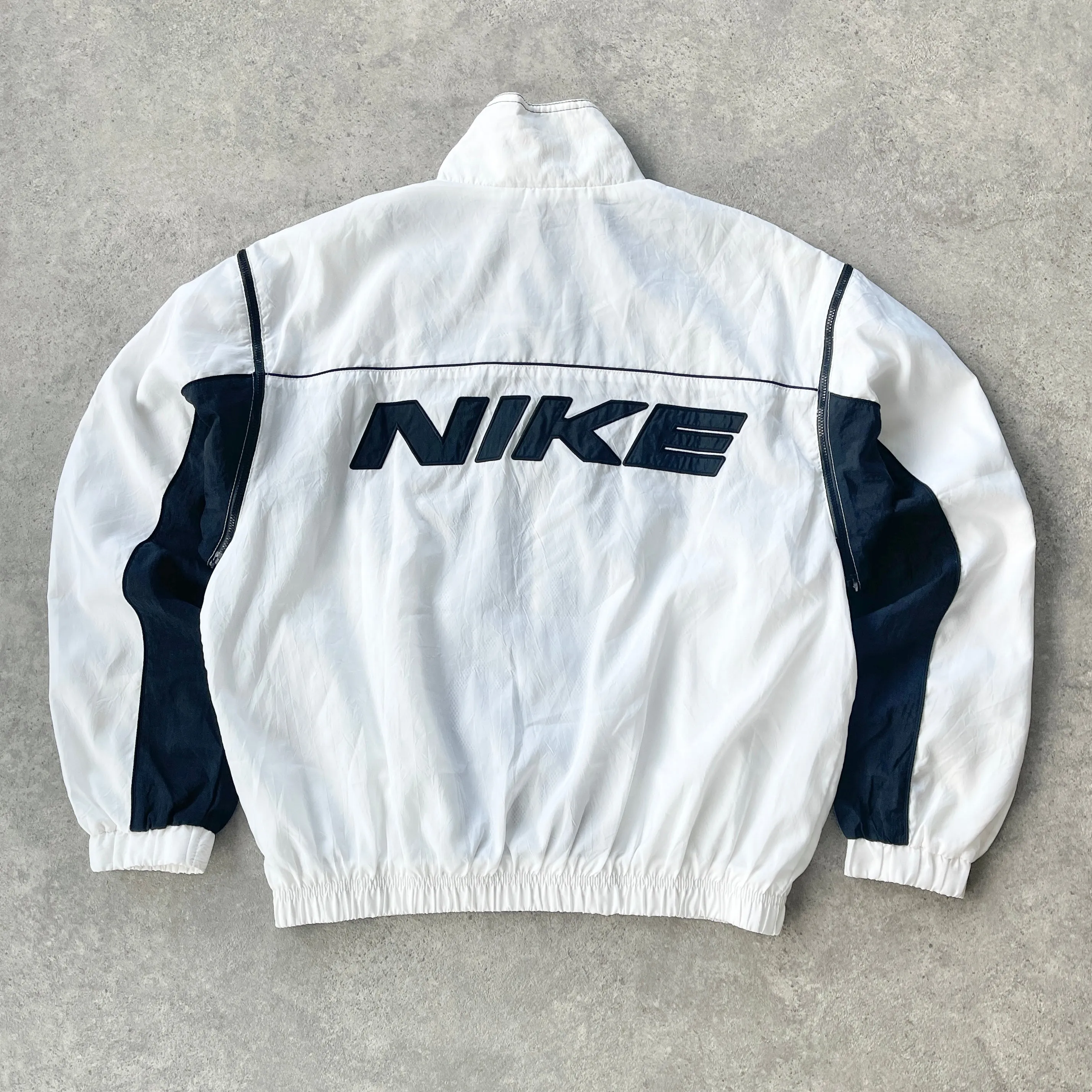 Nike 1990s lightweight convertible spellout shell jacket (L)